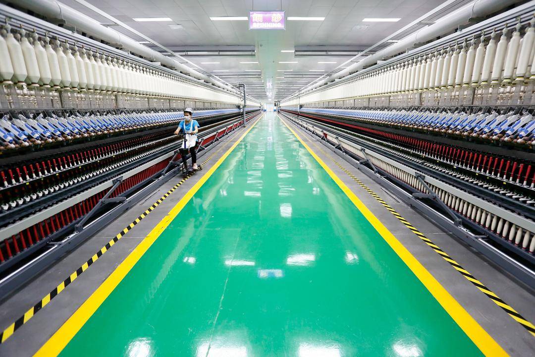 堅定不移推動民營經濟高質量發展|無人車間,智能管理……紡織業長出"
